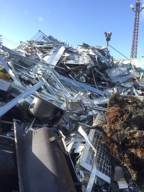 A pile of scrap metal ready to be transported to a recycling facility